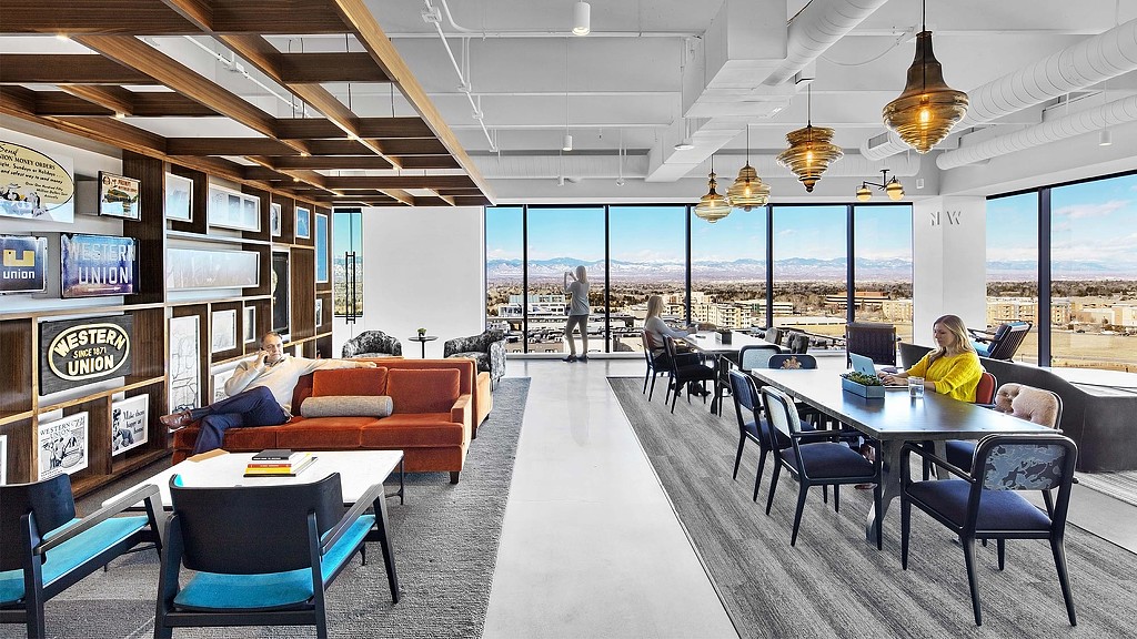 A room with a table chairs and a couch.